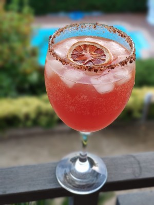 Michelada decorated with dried lemon